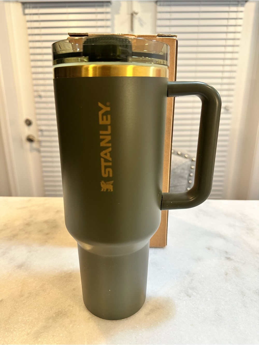 Stanley Olive Green Travel Tumbler with Gold Accent and Handle